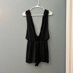 Stella Laguna black romper with lace accent